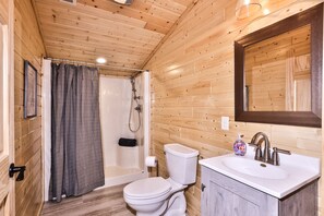 Shower, hair dryer, towels, toilet paper