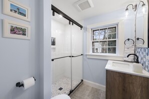 Shower, hair dryer, towels, soap