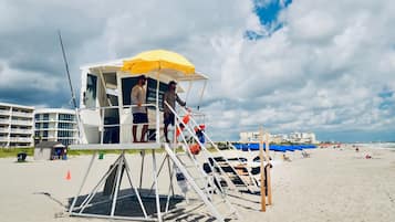 On the beach, sun-loungers, beach towels