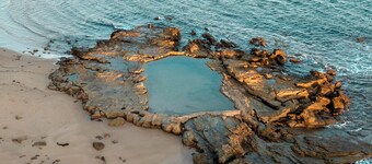 Beach house in award-winning Eco Village surrounded by stunning beaches.