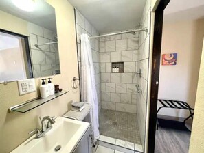 Shower, hair dryer, towels, soap