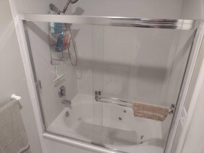 Jetted tub, hair dryer, towels, soap