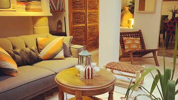 32-inch flat-screen TV with satellite channels