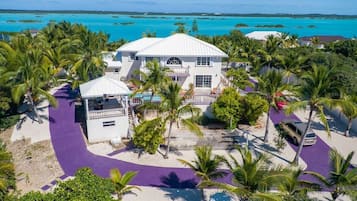 Tropical escape with a pool just steps from calm turquoise waters