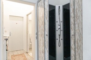 Shower, hair dryer, shampoo