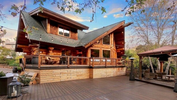 A log cabin with a deck, outdoor seating, and a gazebo. - San Diego’s Luxury Mountain Cabin Retreat (El Cajon)