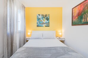 2 dormitorios, tabla de planchar con plancha, wifi gratis y ropa de cama