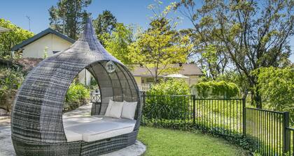 Experience Lavender Cottage, charming, cozy hideaway set in pretty bushland.