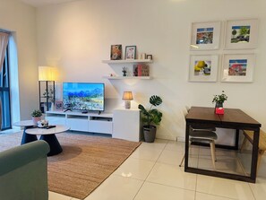 Comfort Apartment | Living area | 43-inch LCD TV with digital channels