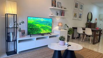 Comfort Apartment | Living area | 43-inch LCD TV with digital channels