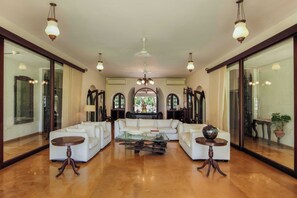 Flat-screen TV - Amã Stays & Trails Villa Ishatva, Alibag (Alibag)