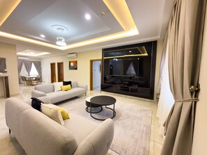 50-inch Smart TV with satellite channels - The AUD Luxury Apartments (Kumasi)