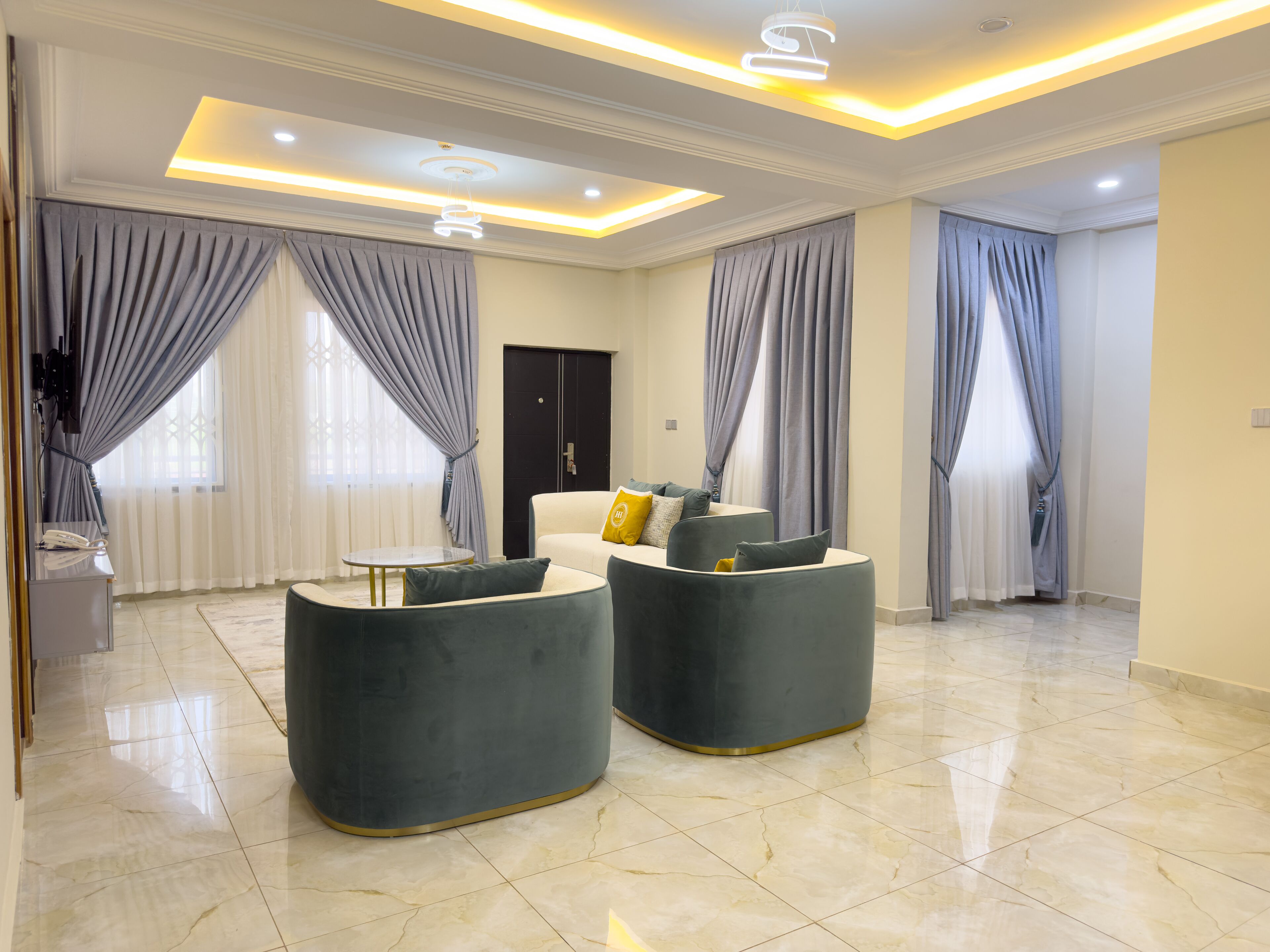 Luxury Apartment, 3 Bedrooms | Living area | 50-inch Smart TV with satellite channels