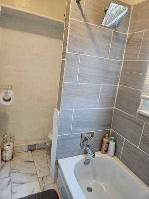 Hair dryer, towels, soap, shampoo