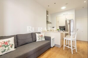 TV, fireplace - Apto. Alejandro - apartment in central Ribadesella, Northern Spain (Ribadesella)
