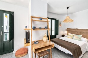 1 bedroom, desk, iron/ironing board, travel crib