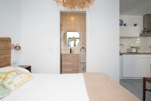 1 bedroom, desk, iron/ironing board, travel crib