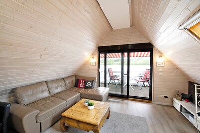 House 'Boathouse on the Müritzarm' with Lake View, Private Terrace & Motorboat (4 HP)