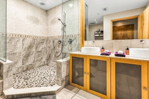 Shower, hair dryer, towels, shampoo
