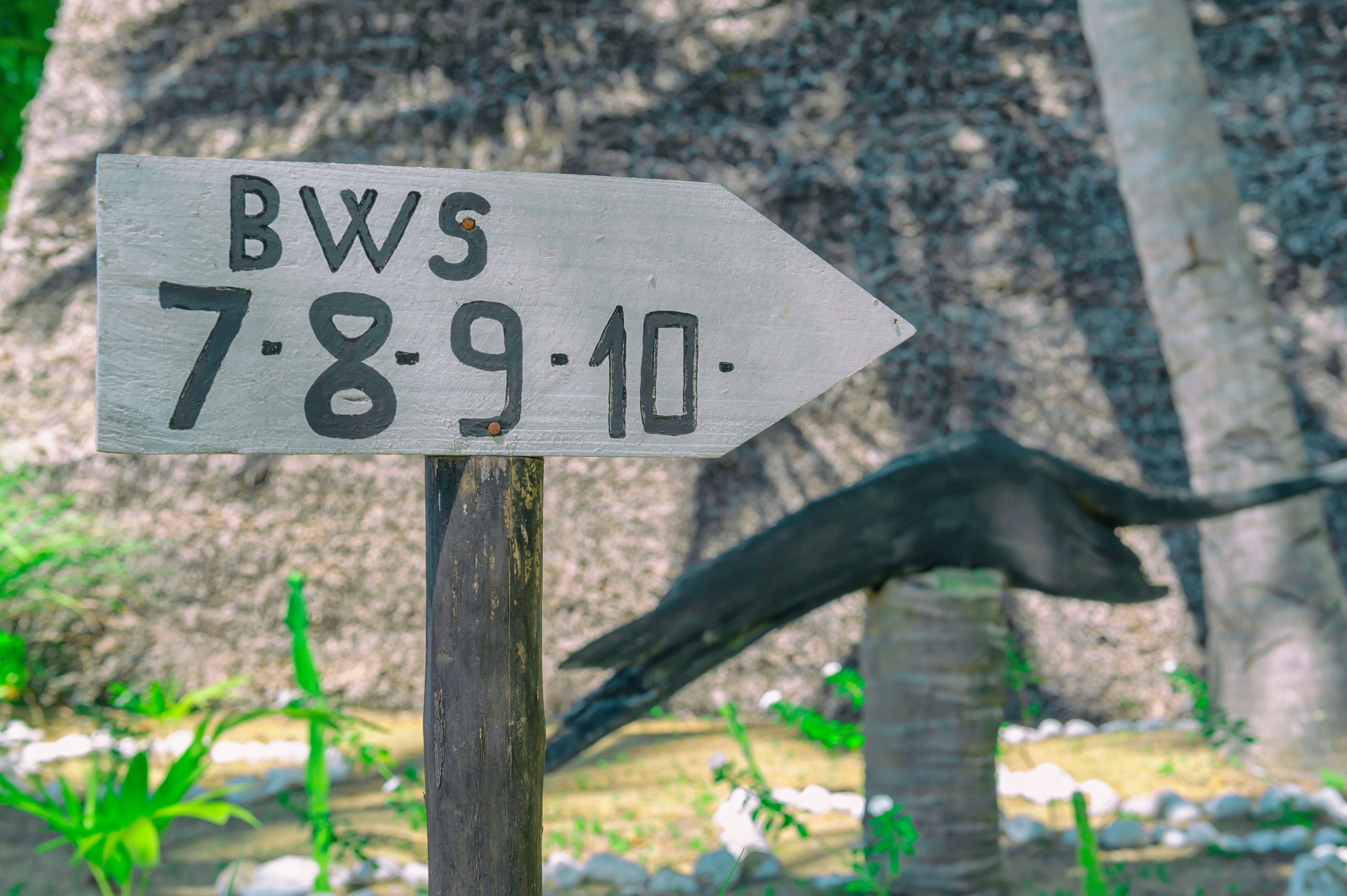 A directional sign with the text "BWS 7.8.9.10."