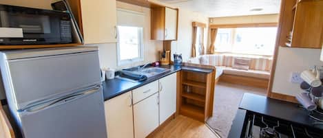 Microwave, oven, stovetop, cookware/dishes/utensils