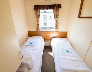 3 habitaciones y ropa de cama