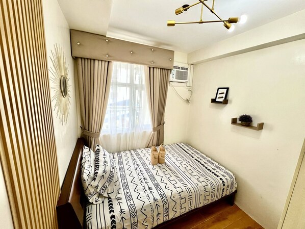 Family Condo | 2 bedrooms, desk, free WiFi - Seawind Condo 2BR Near Samal and Airport (Davao)