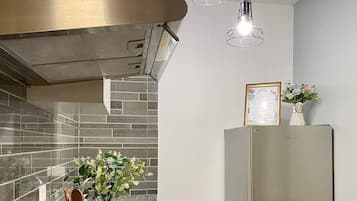 Family Condo | Private kitchen | Fridge, microwave, rice cooker, cookware/dishes/utensils