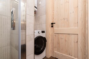 Apartment, 2 Bedrooms, Sauna, Beachside | Bathroom | Shower, towels