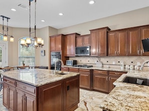 Oven, dishwasher, coffee/tea maker, paper towels