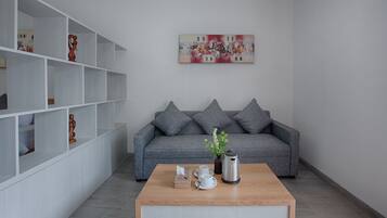Chambre Deluxe, vue jardin (Deluxe Upper Floor) | Coin séjour