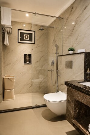 King Room | Bathroom | Shower, hair dryer, towels, soap - Hotel Cresent Near Assi Ghat (Varanasi)