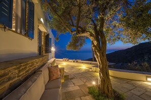 Front of property - evening/night - Peftasteri Villa (Tinos)