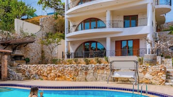 Seasonal outdoor pool, pool umbrellas, sun loungers