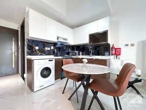 Apartment (0 Bedroom) | Private kitchenette | Microwave, oven, stovetop, electric kettle - Stunning Studio With Balcony in Arjan (Dubai)