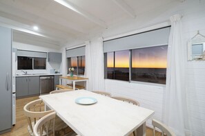 Outdoor dining - Beachfront 3BR Home with Stunning Ocean Views (Quinns Rocks)