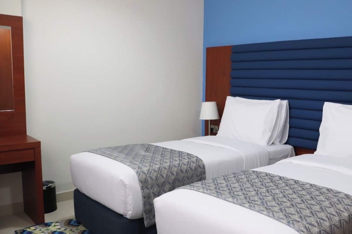 Deluxe Apartment, 2 Twin Beds | In-room safe, blackout drapes, soundproofing, iron/ironing board