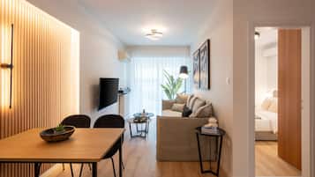 Apartamento design | Área de estar | Smart TV 47 polegadas com canais a cabo