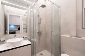 Design Apartment | Bathroom | Shower, hair dryer, towels, soap - Chic and Lavish Apartment in Athens (Kallithea)