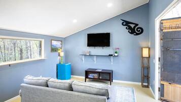 TV, DVD player, foosball, books