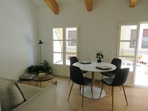 Superior Apartment | Living area | 50-inch Smart TV with digital channels