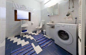 Regadera y secadora de cabello