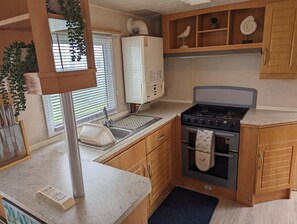 Cabin | Private kitchen | Fridge, microwave, oven, stovetop - Sandy Paws Anderby Creek - Very Dog Friendly (Skegness)