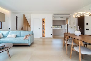 Luxury Villa | Living area | 55-inch Smart TV with satellite channels, fireplace - Canvas Villas By the Sea (Malevizi)