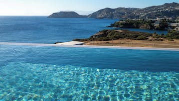 Seasonal outdoor pool, pool loungers