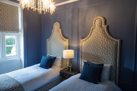 Family Room | Premium bedding, desk, laptop workspace, soundproofing