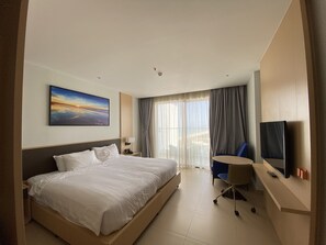 Minibar, in-room safe, desk, laptop workspace - Arena Resort Luxury With Ocean View (Cam Ranh)