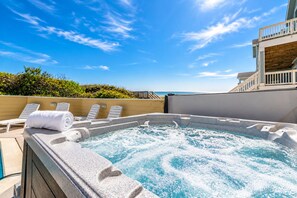 A hot tub with a clear view of the ocean, surrounded by lounge chairs and a wooden deck. - 🌊 Ultra-Luxury OCEANFRONT | Private Heated Pool🏖️Hot Tub & Unmatched Views! (Corolla)