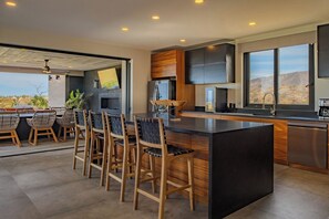 Fridge, microwave, oven, stovetop - Casa Sonrisa: Modern home on Club Campestre Golf. Promos available. (San Jose del Cabo)