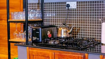 Fridge, microwave, toaster, cookware/dishes/utensils